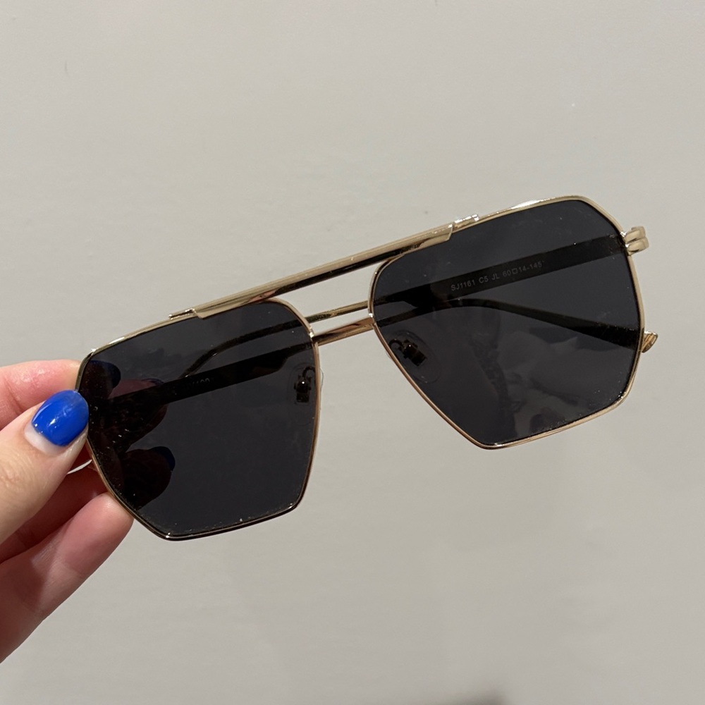Elegant Gold and Black Sunglasses